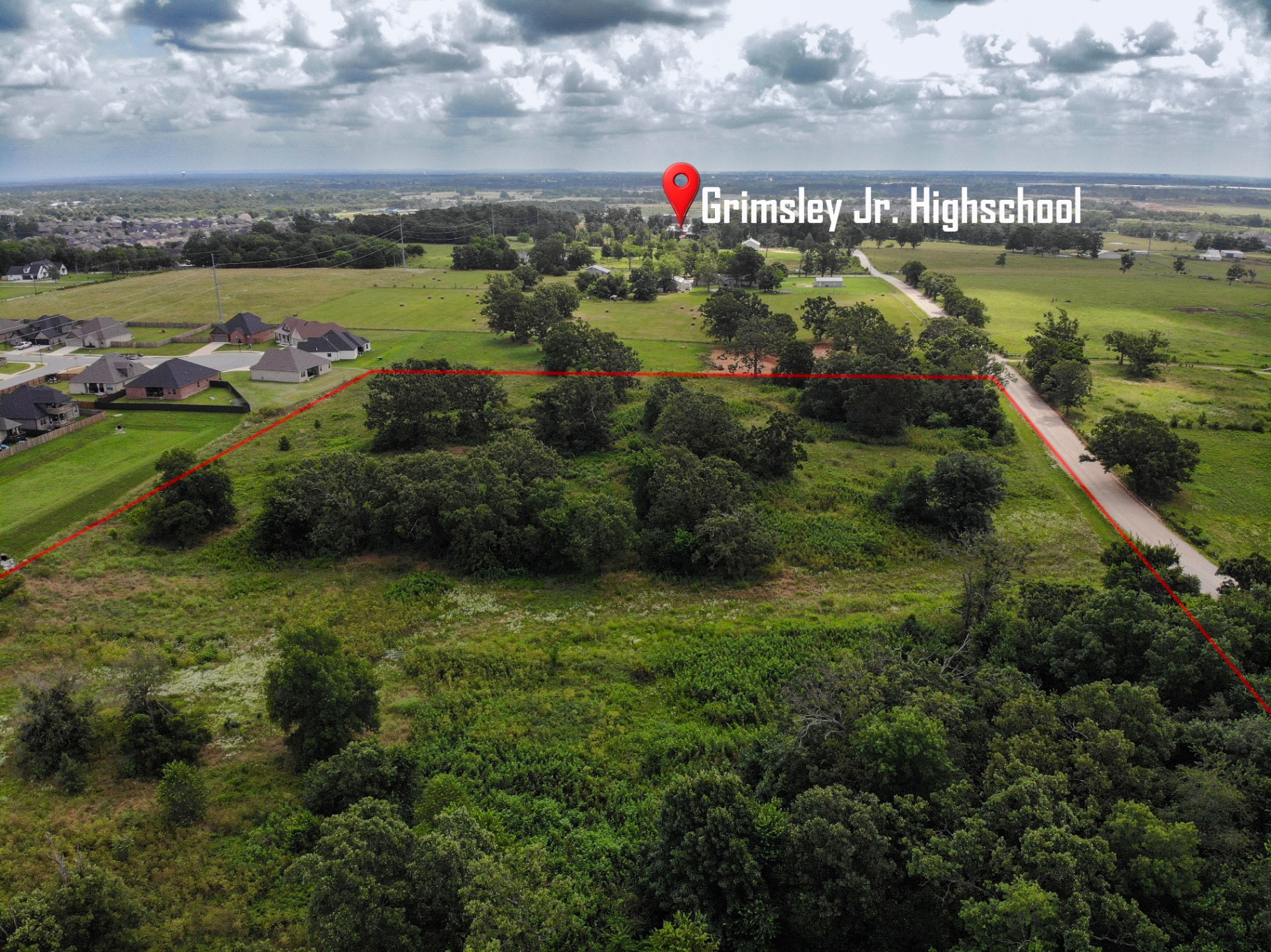 Lot near Grimsley Jr. Highschool with boundary overlay — Northwest Arkansas